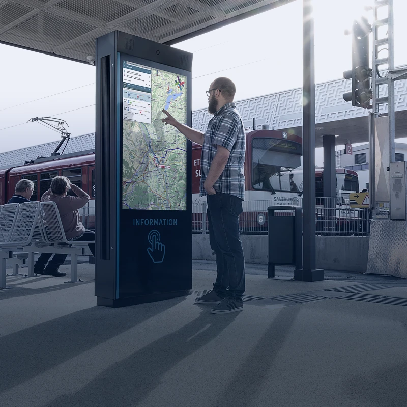 Help points for train stations improving passenger safety Commuter using digital help point at train station to access travel and safety information